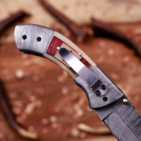 Custom Damascus folding knife with pocket clip for everyday carry use