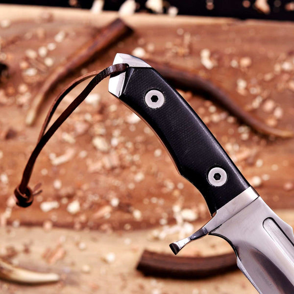 Full-tang black micarta handle on a D2 steel bowie knife