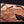Hand holding a rambo 3 bowie knife showcasing spine close up