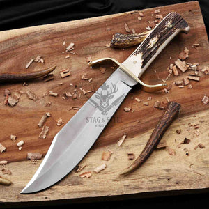 D2 steel western bowie knife with antler handle on wood