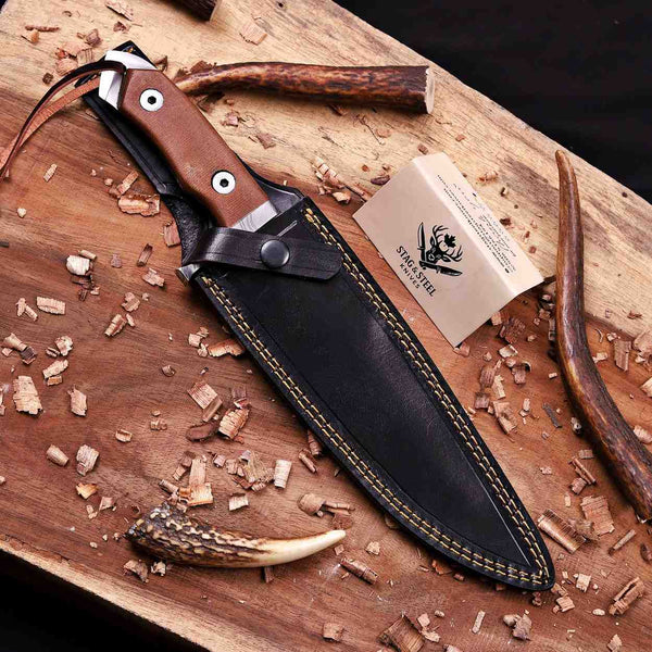 Damascus bowie knife in black leather sheath with leather cord and care card
