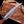Clip-point tip of a handmade VG10 Damascus bowie knife