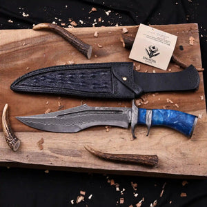 San Mai Damascus bowie knife beside croc-embossed Italian leather sheath