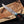 copper damascus bowie knife double guard in hand
