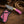 Full profile of handmade Damascus cowboy knife with pink turquoise composite handle