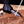 Damascus folding knife performing rope cutting task during edge sharpness demonstration