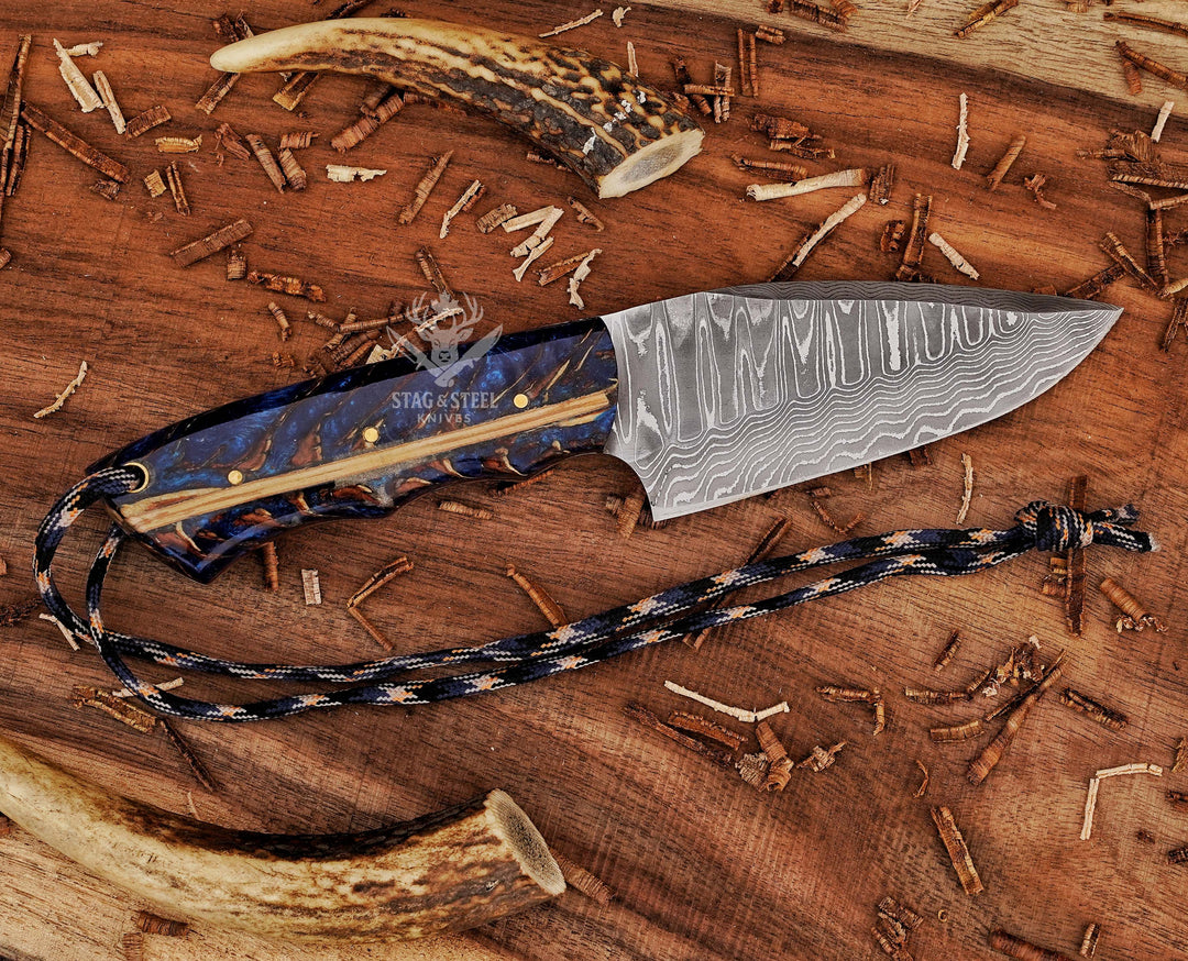 Damascus steel blade on skinning knife