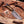 Damascus skinning knife with pine cone resin handle and copper skull pin