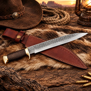 Handmade engraved dirk dagger with brass crossguard and tooled leather sheath
