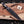 Expendables toothpick bowie knife seated in brown leather sheath with belt loop