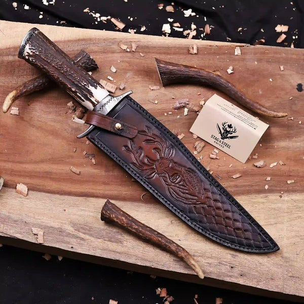 Feather Damascus bowie knife seated in red deer embossed Italian leather sheath