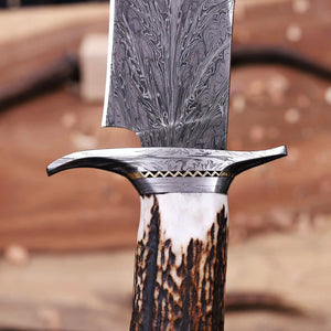 Fire Pattern Damascus guard close-up on feather Damascus bowie knife