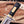 Black G10 grip with brass engraving plate viewed from blade side on D2 bowie