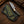 Full profile of a handmade Damascus cowboy knife with green pine cone resin handle