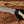 Hand-forged Damascus Kukri Bowie knife crafted for outdoor use