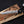 handmade D2 steel bowie knife held in hand showing full blade