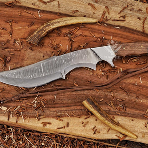 Handmade Damascus Bowie knife with walnut wood handle