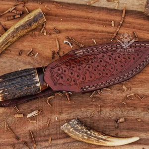 Handmade small Damascus hunting knife with leather sheath