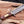 Close-up of Damascus guard and rosewood handle on Iron Mistress bowie knife