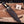Iron Mistress D2 bowie knife seated in tooled Italian leather sheath with strap