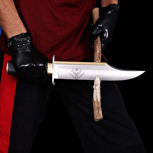 Jim Bowie Edition D2 bowie knife cutting a wooden branch in strength test