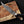 Juan Padillo Damascus Bowie knife held in a gloved hand, clip-point blade detail