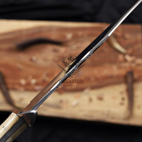 Edge-on view of the D2 Bowie blade showing the hand-filed spine