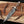 Juan Padillo Damascus Bowie knife with stag antler handle and Damascus guard on a wooden board with antlers