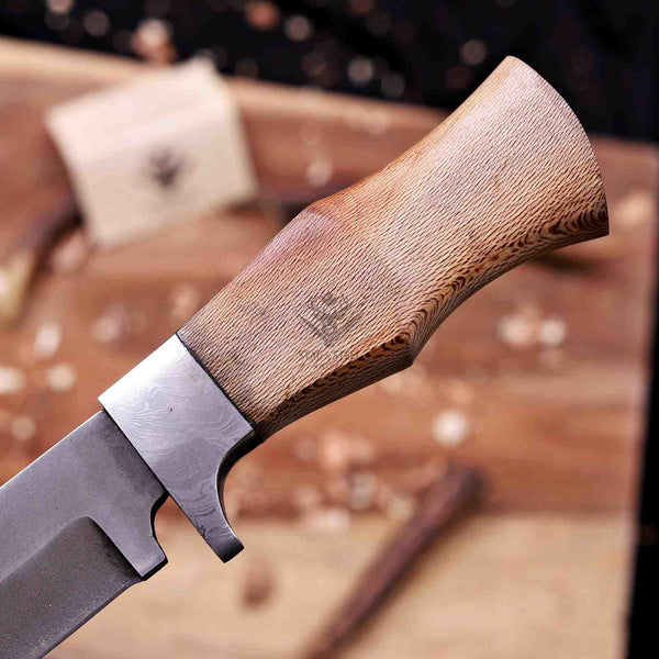 Flecked lacewood grain close-up on full tang D2 hunting knife handle