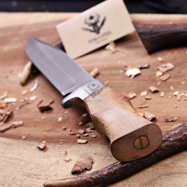 Lacewood pommel with brass pin securing the hidden full tang on D2 hunting knife