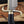 Black G10 handle and brass guard detail of handmade Musso bowie knife