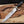 Musso bowie knife showing D2 steel sweeping clip point blade and brass back strap