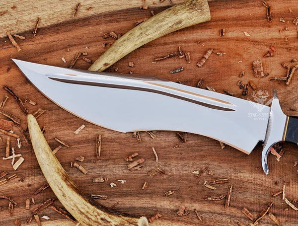 Survival bowie knife used for camping and outdoor tasks