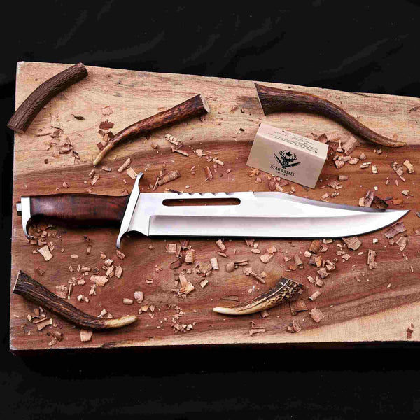 Rambo 3 Knife with Rose wood handle on a wooden surface 