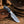 Rasp steel cowboy knife with blue pine cone resin handle on weathered barnwood