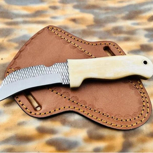 Polished cream bone handle with pinned construction on a rasp steel  hawkbill knife