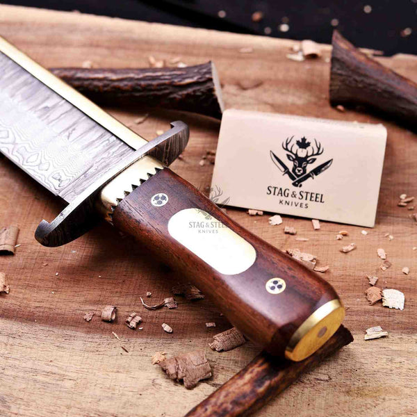 Close-up of rosewood handle grain on Damascus Iron Mistress bowie knife