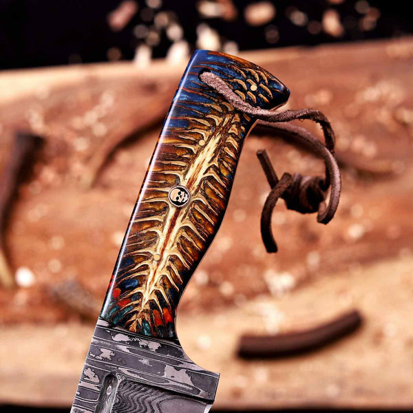 Exotic pine cone handle with copper Masonic skull pin on Damascus hunting knife