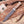 Full profile of stonewashed D2 full tang hunting knife with lacewood handle on board