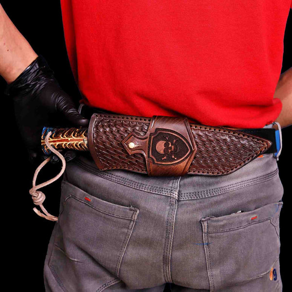 Tanto knife in horizontal carry leather sheath on belt