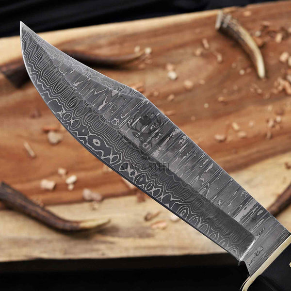 Close-up of VG10 Damascus pattern on a western bowie blade