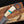 Decorative knife with a detailed handle on a wooden surface