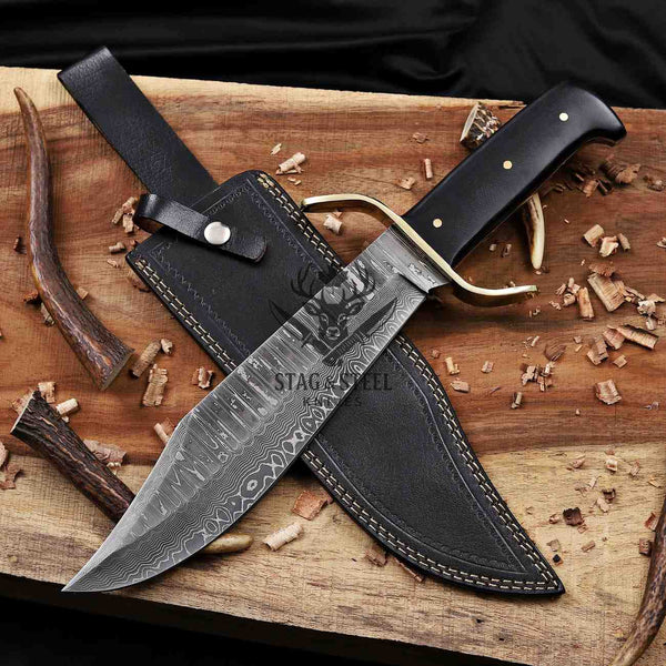 Western Damascus bowie knife with black leather sheath and Stag Steel Knives care card