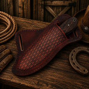 Brown leather boot jack with intricate pattern on a wooden surface with rope and horseshoe.
